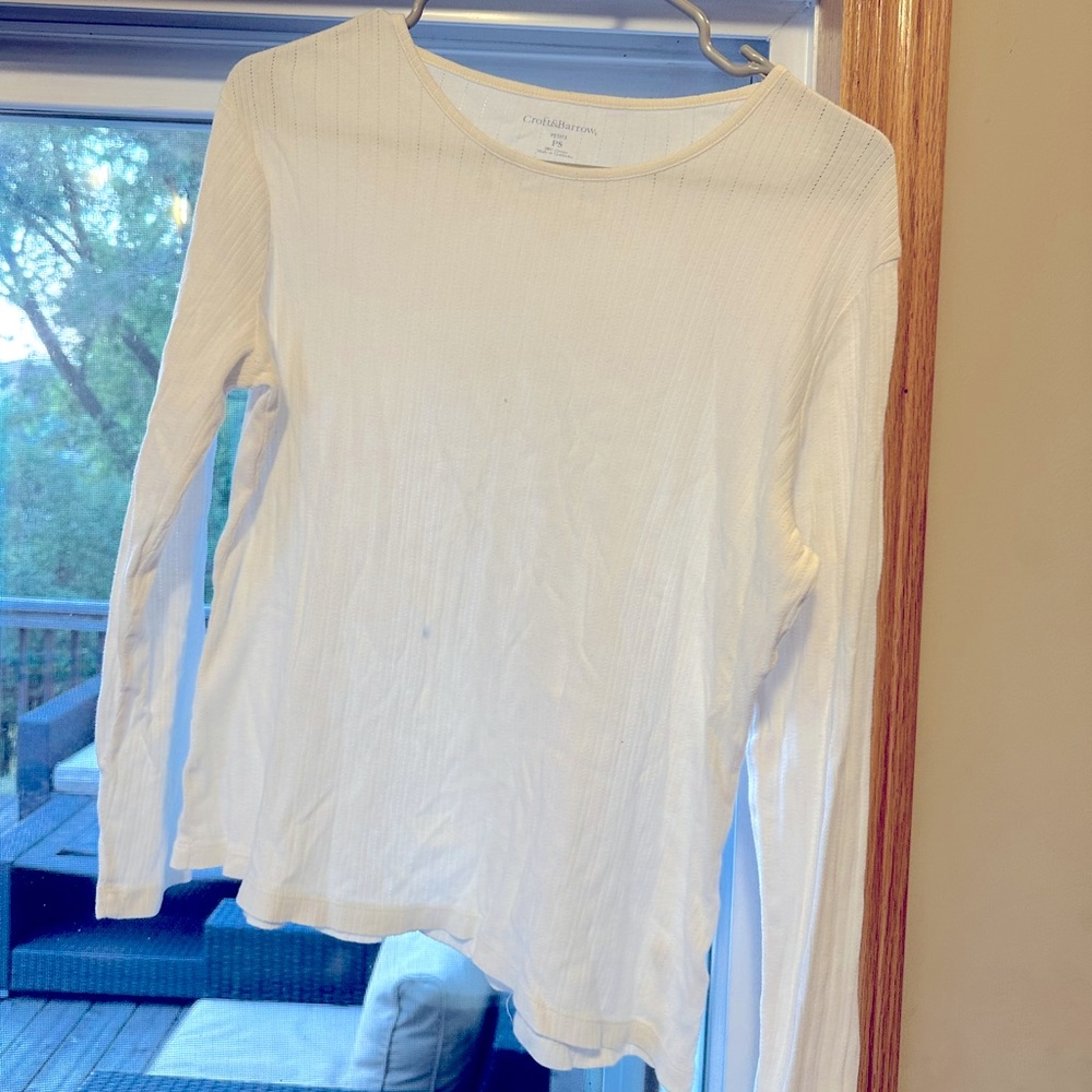 white long sleeve with small accent holes